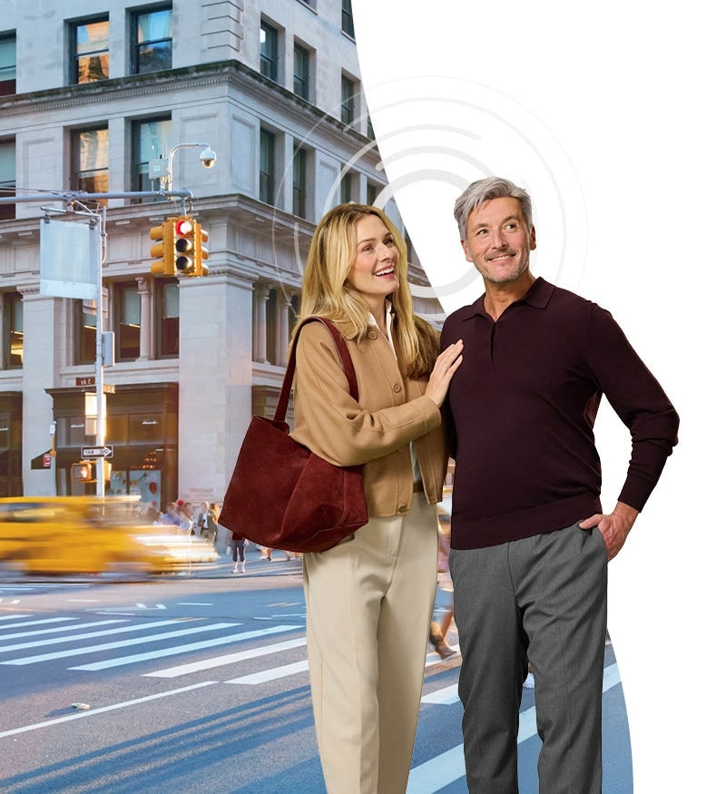 Couple walking and talking in a big city Couple walking and talking in a big city